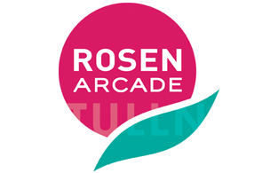 Rosenarcade Tulln Logo in weiß auf rosa Kreis und türkiser Welle 