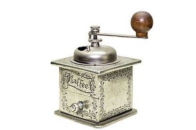 Alte silberne Kaffeemühle zum Drehen 