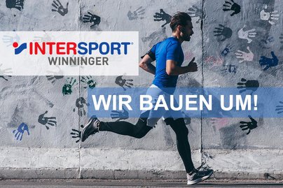 männlicher Läufer mit blauem T-Shirt Intersport baut um